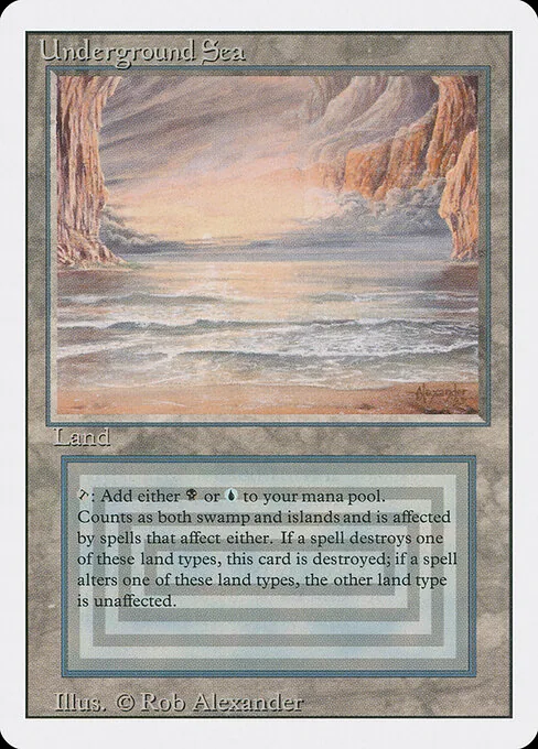 Underground Sea, a Revised-edition dual land with the white border and swamp/island typing